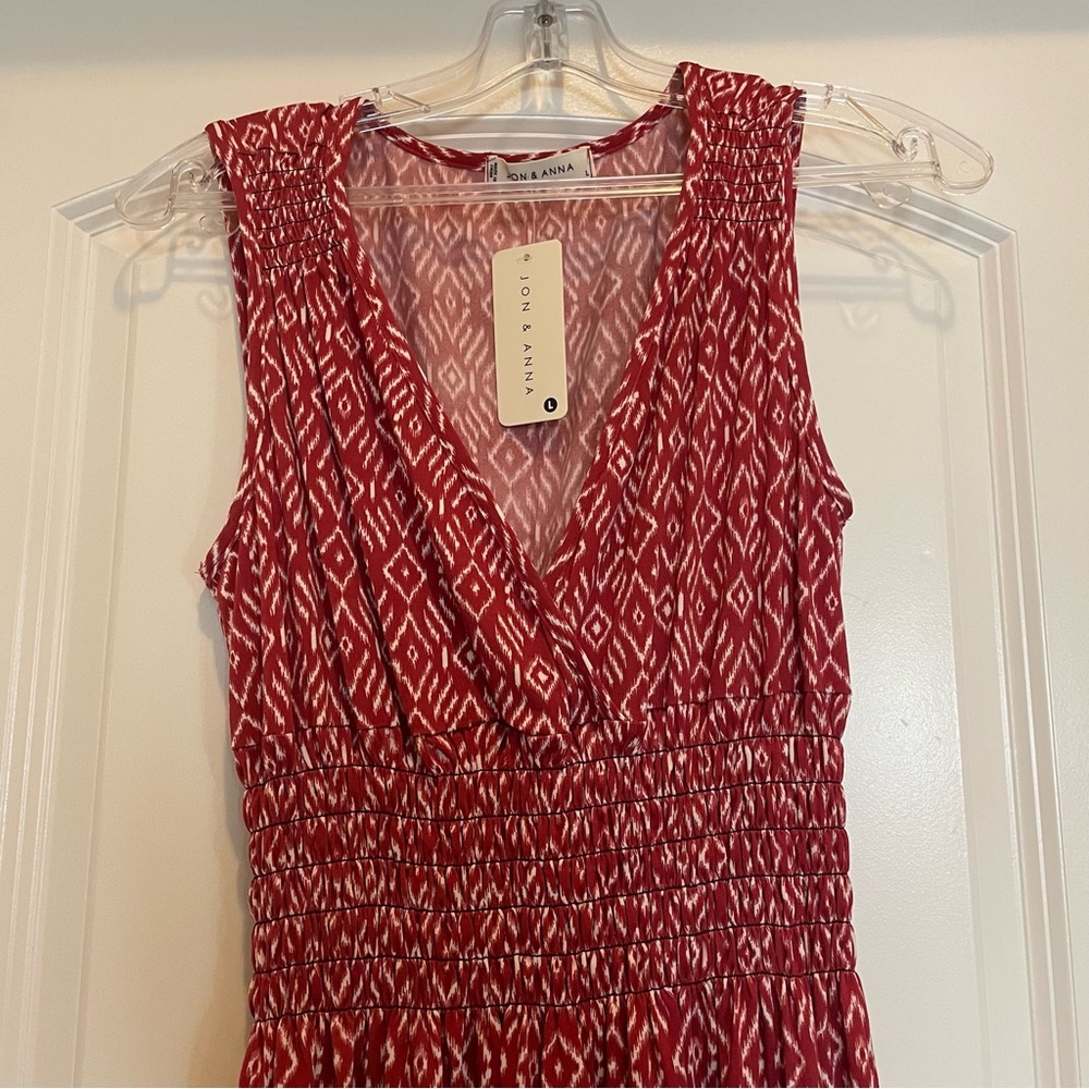 New, with tags never worn .  Dress from Amazon size L
